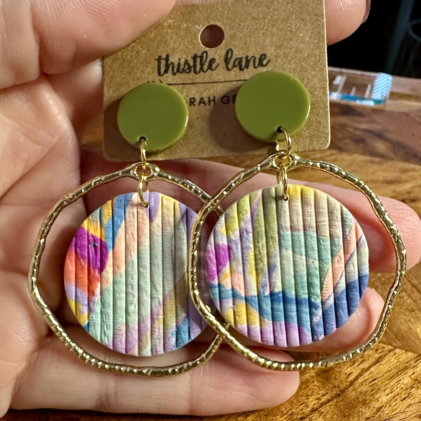 Dangle - Gold Organic Circle Framed Multi Colored Ribbed Circle